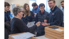 Student e-racing team hands on with connectors at Lane